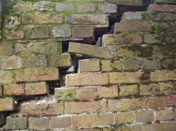 Significant cracking in old brick wall